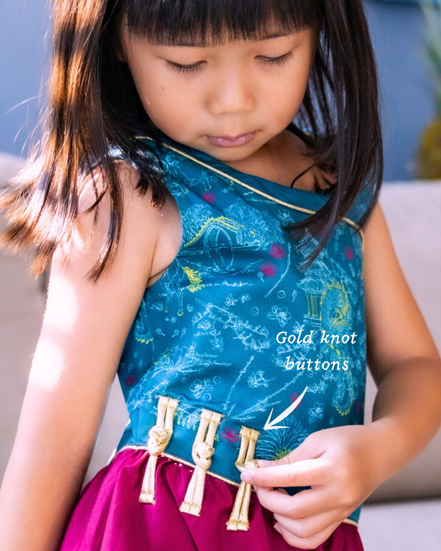 Wild Zodiac teal girl’s dress